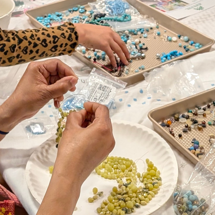 2025 Attendees making jewelry at a CTX Learning Festival event
