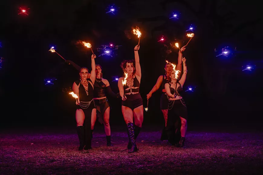 Dancers, fire, and drones share the same stage &mdash; a large-scale visual composition in the sky and on the ground, set at sunset.