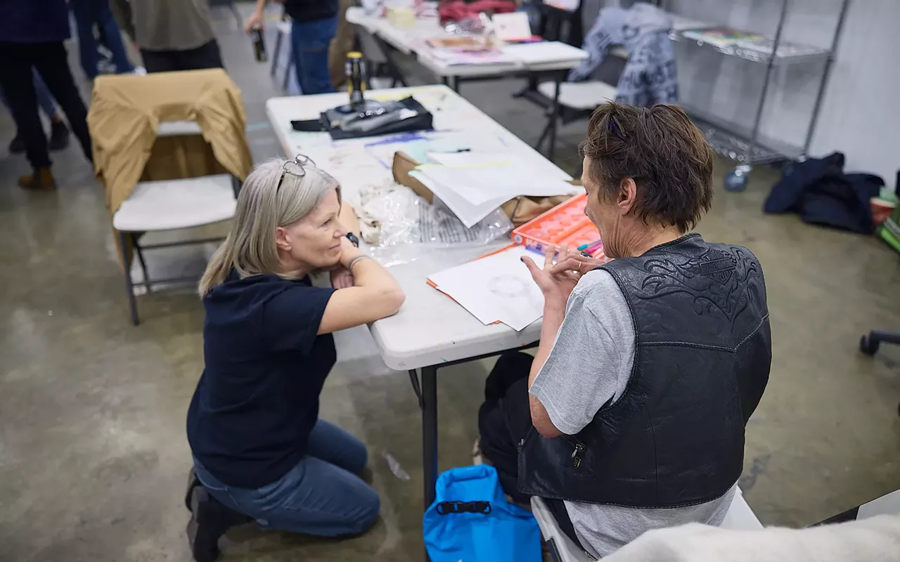 Image: Volunteer with Art From the Streets